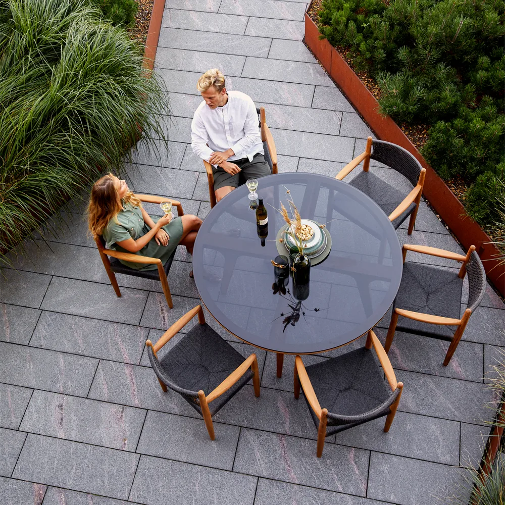 Aspect dining table round, Smokey black-teak Cane-line