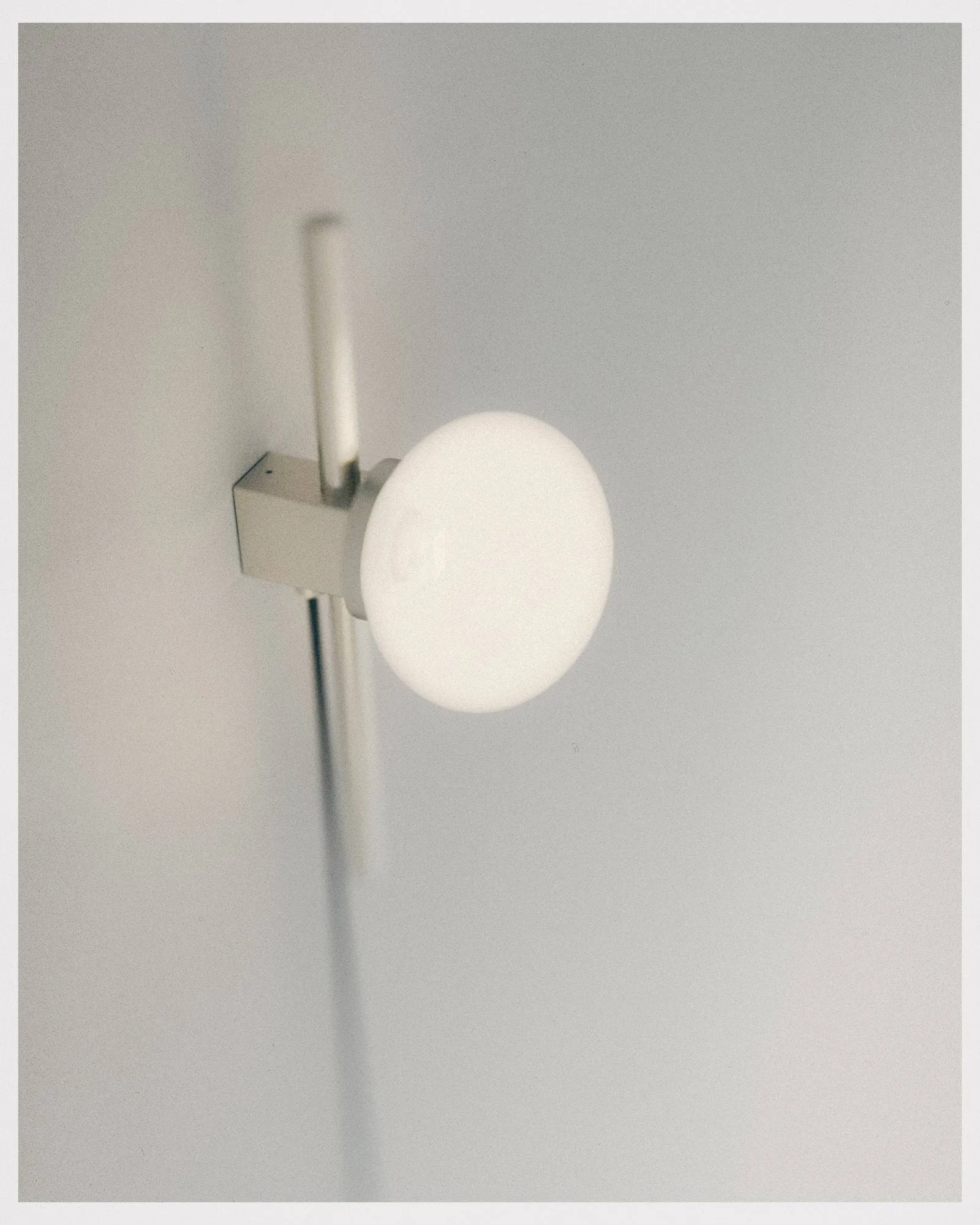 Ovoid Single wall lamp, Stainless steel-opal glass FRAMA