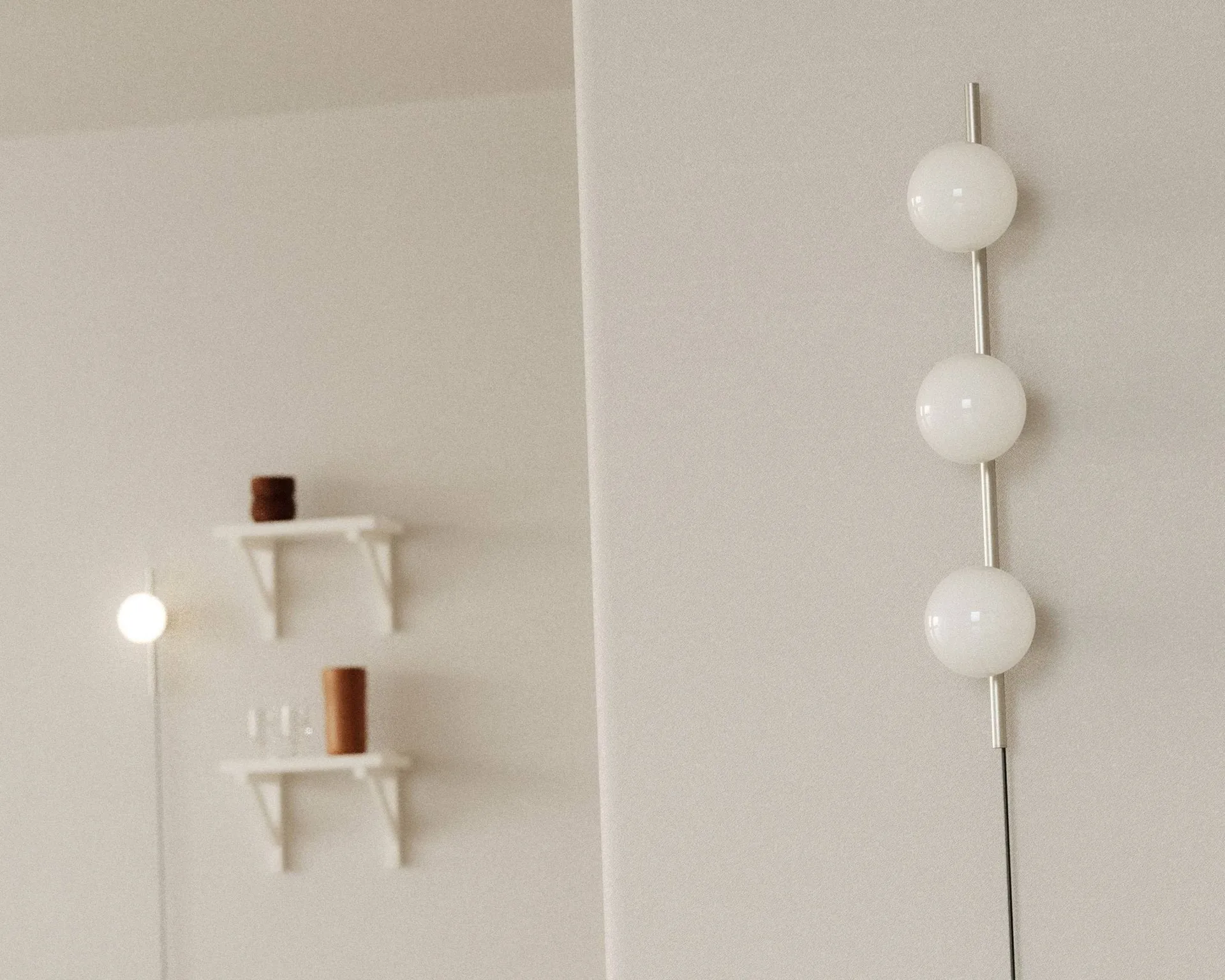 Ovoid Single wall lamp, Stainless steel-opal glass FRAMA