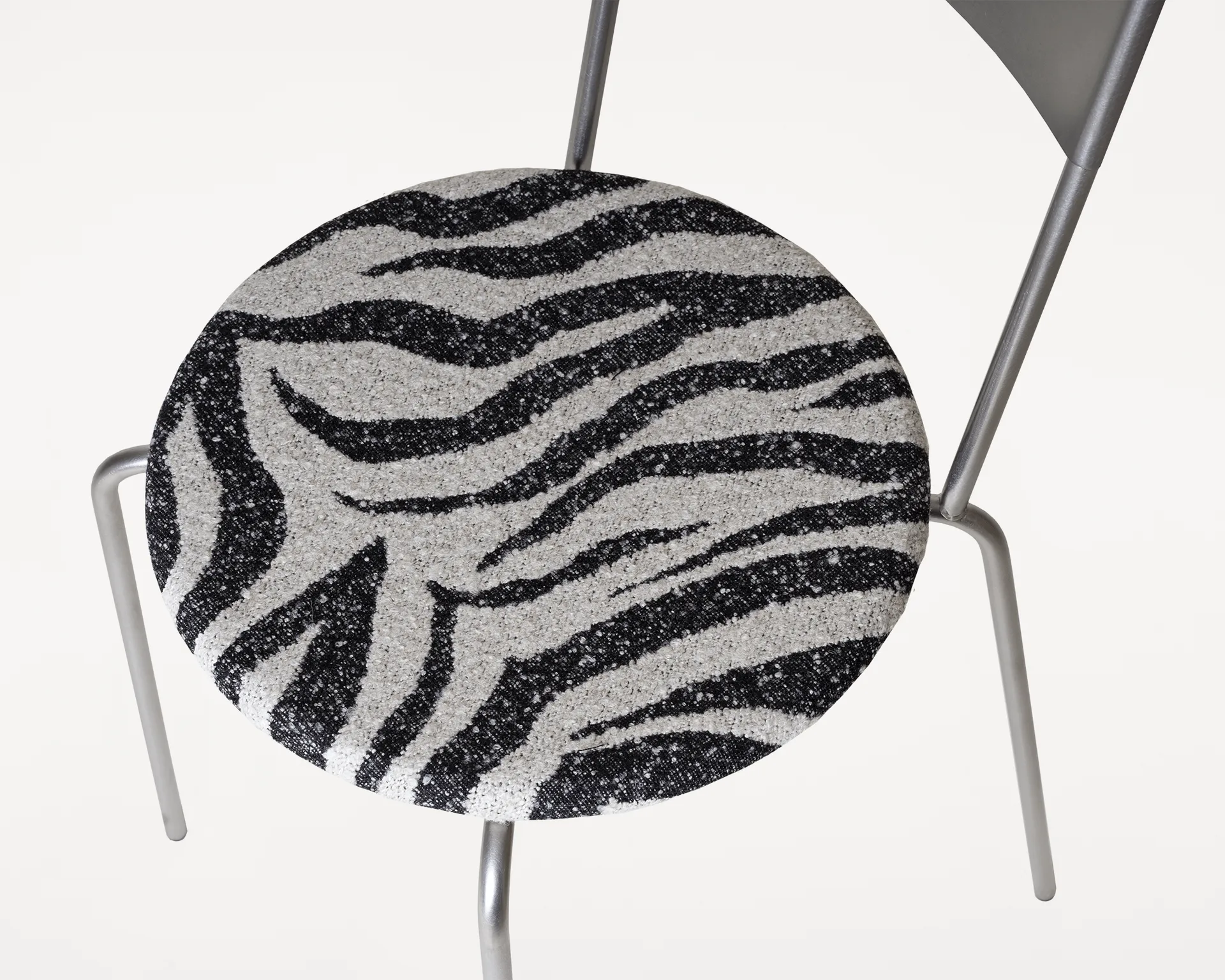 Petit Rond chair, Stainless steel-fabric Zebra FRAMA