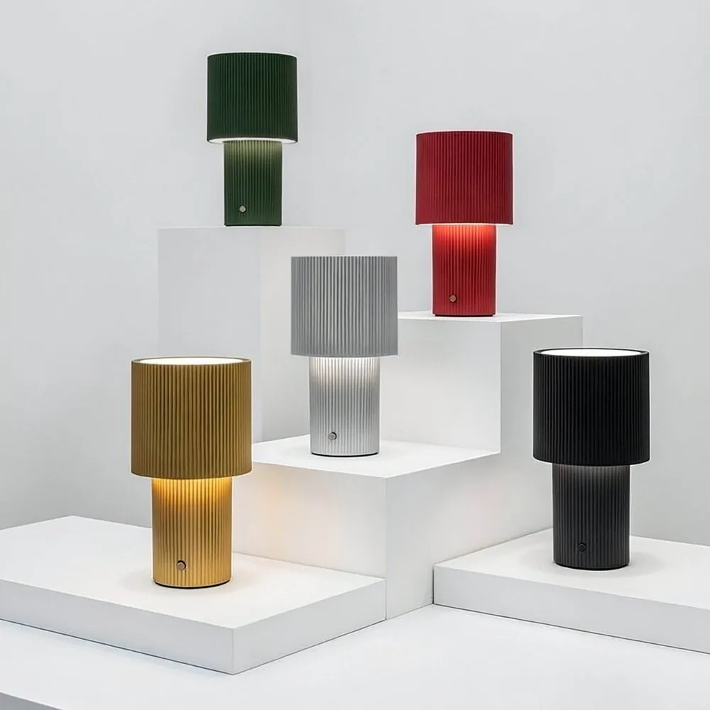 Iluma portable table lamp, Gold Herstal