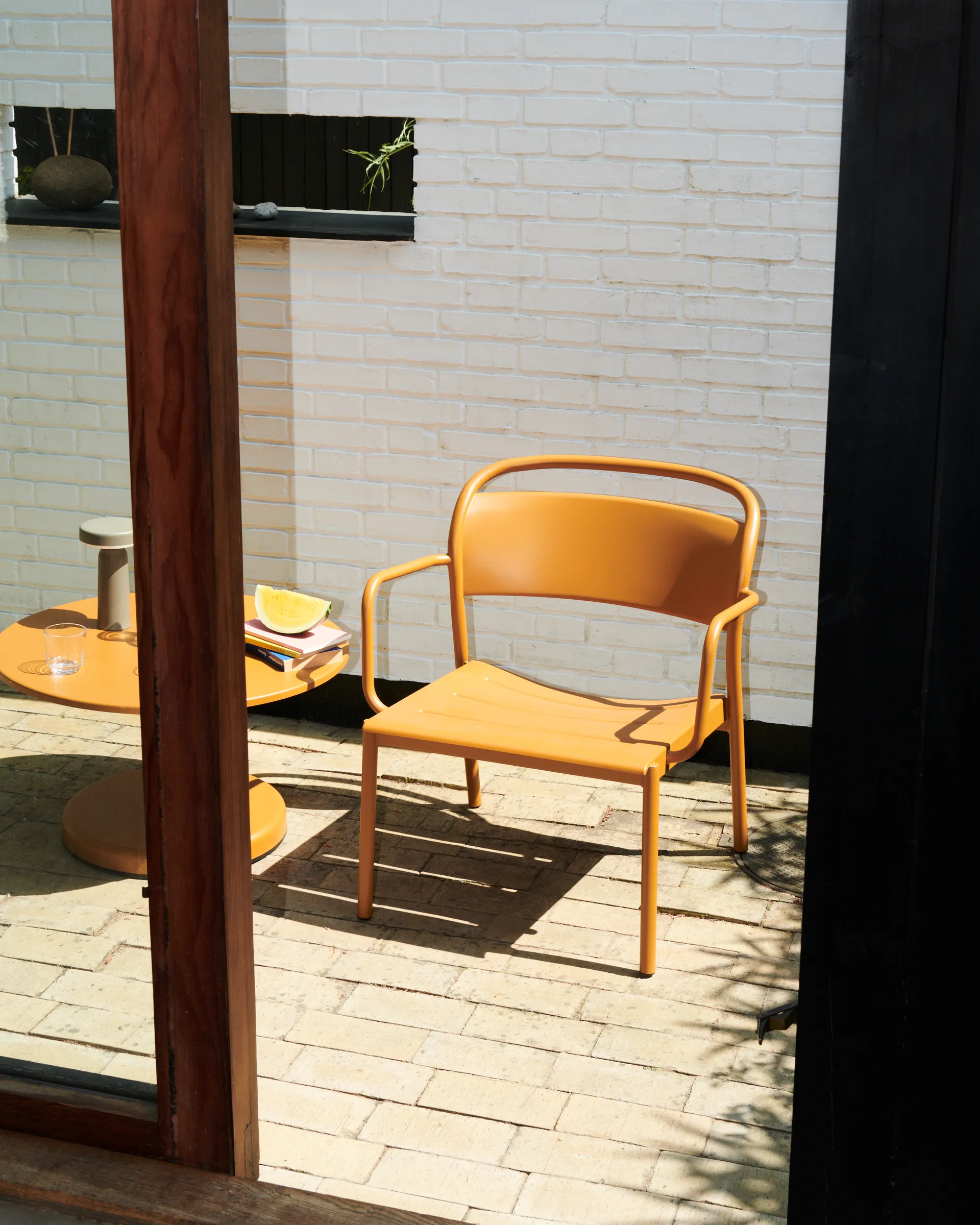 Linear Steel lounge armchair, Burnt orange Muuto