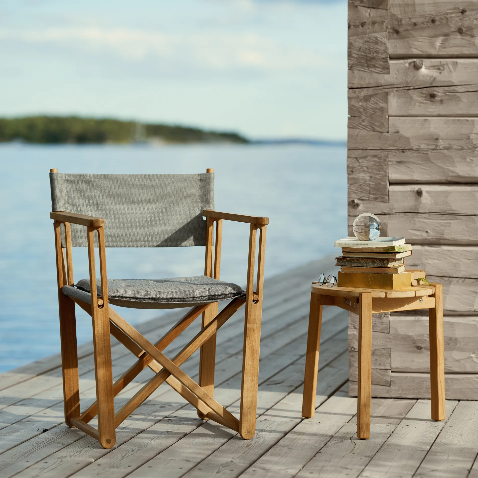 Kryss Lounge armchair, Agora Nautic navy blue, teak Skargaarden