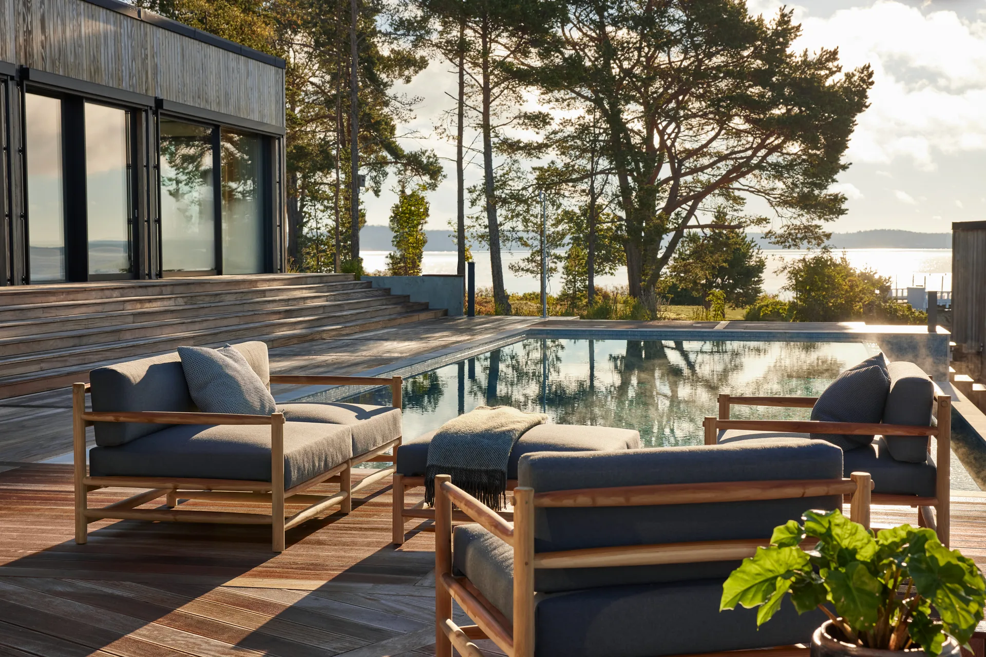 Saltholm lounge armchair teak-grey brown cushion Skargaarden