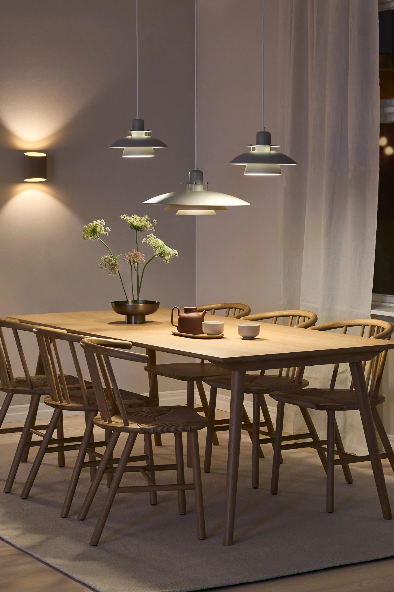 Illuminate your dining room with different type of dining room light ideas like the Picasso ceiling lamp and the Sinne wall lamp. 