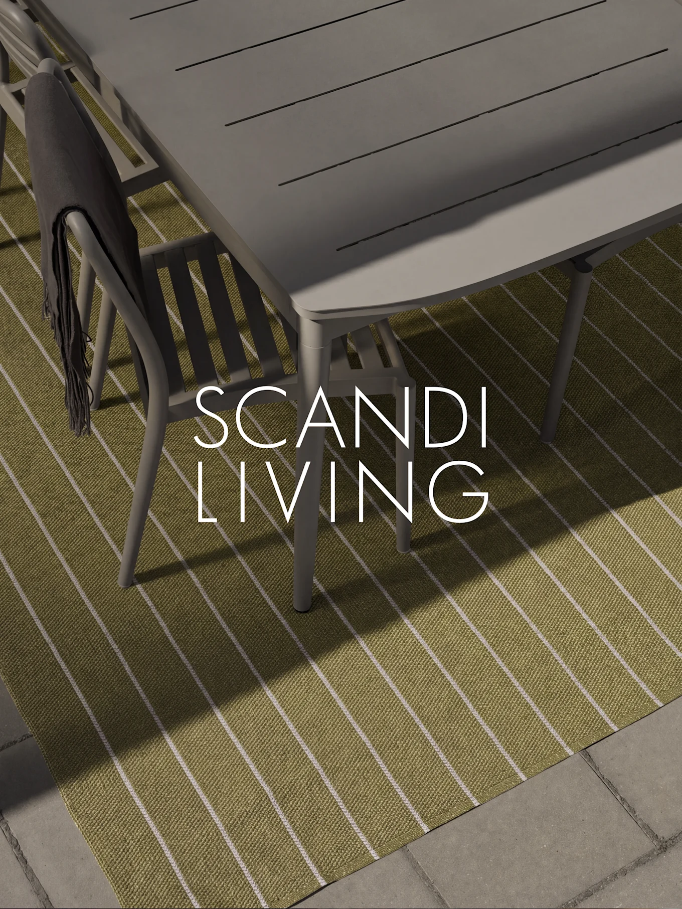 Outdoor dining set on green striped rug with dark throw, 'SCANDI LIVING' text overlay.
